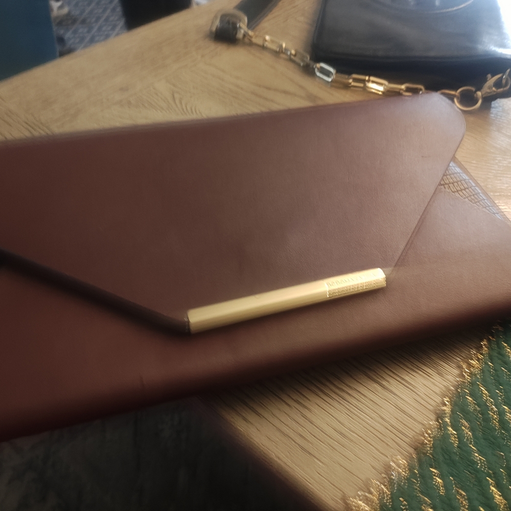 BCBG Brown and Gold Clutch with Sophisticated Design